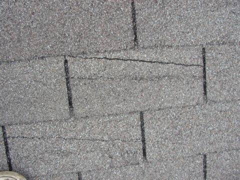 Wind damaged shingles